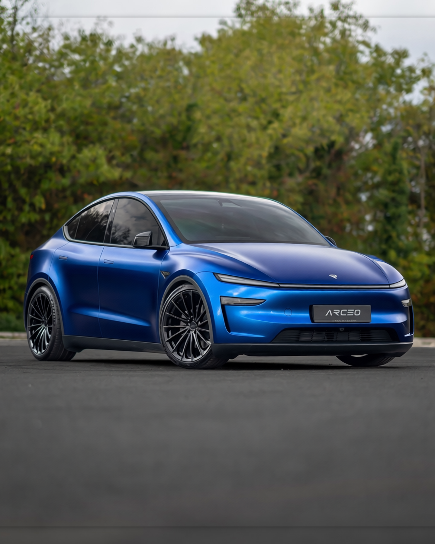 Tesla Model Y rendered in Frozen Satin Metallic Navy gloss wrap