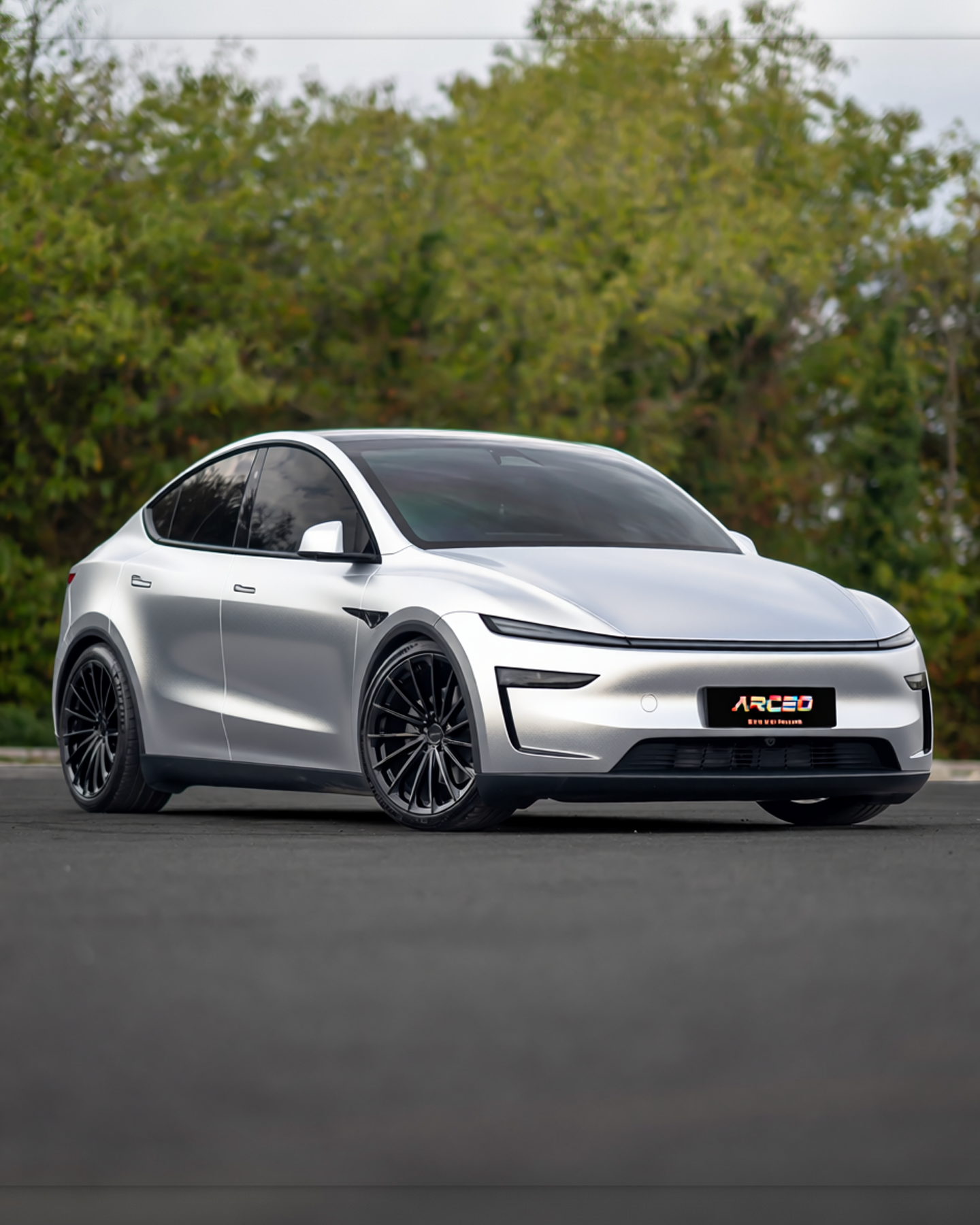Tesla Model Y rendered in Super Silver Mist gloss wrap