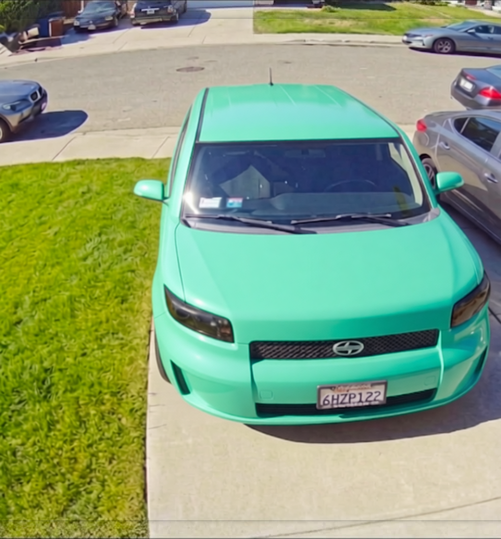Car rendered in Super Gloss Pearl Neon Mint gloss wrap