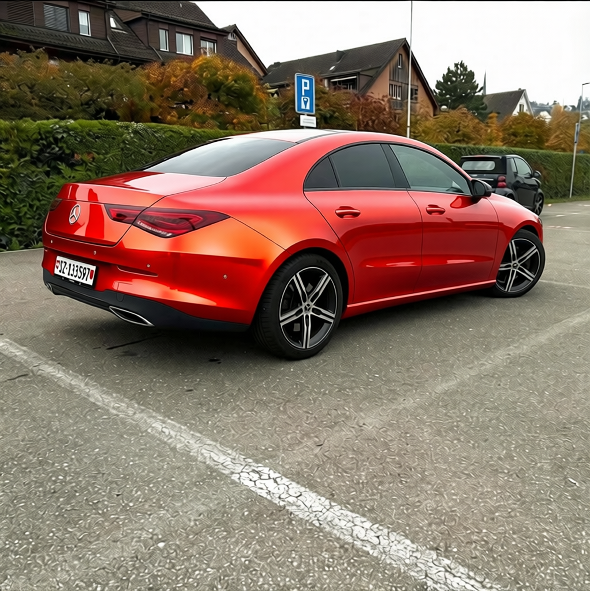 Car rendered in Gloss Dragon Fire Red gloss wrap